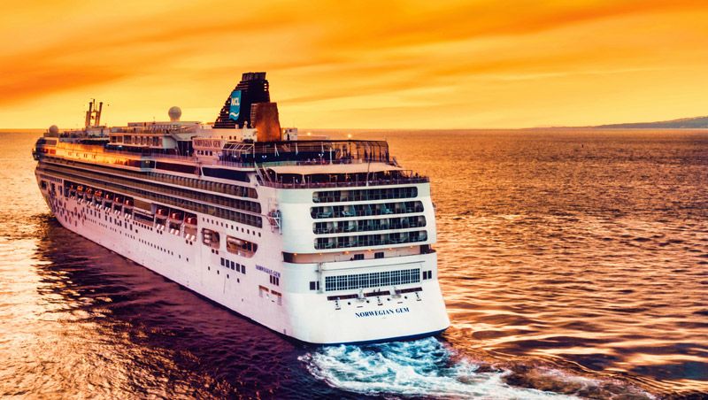 cruise ship at sea at twilight